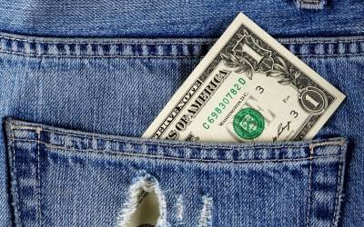 A Jeans Pocket With A Dollar Bill Background Thumbnail