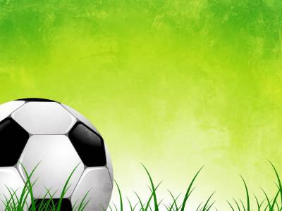 Soccer Ball On Green Grass Abstract Background