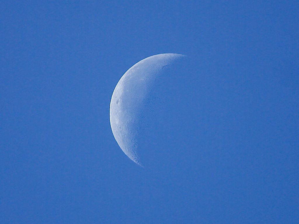 Moon on blue sky Background